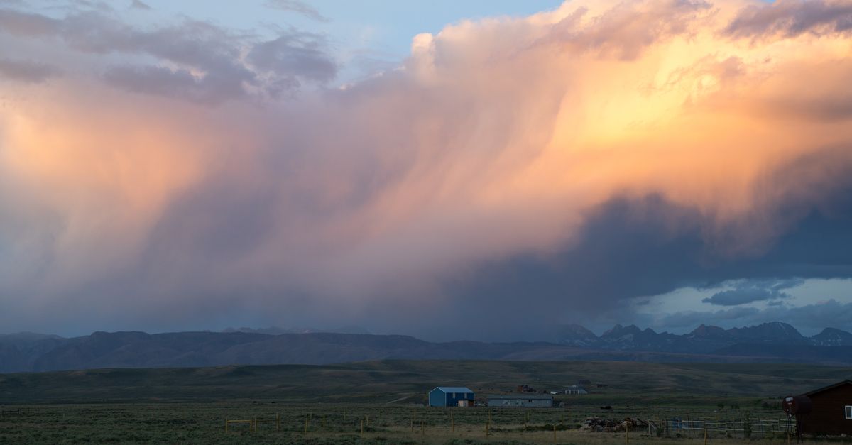 Stunning sunset cloud formation over a rural landscape near Pinedale, Wyoming.